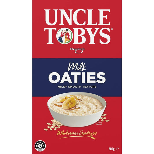 Front of a Uncle Tobys Flemings Milk Oaties 500g box, featuring a red and navy blue design with a bowl of oatmeal and banana on the front.