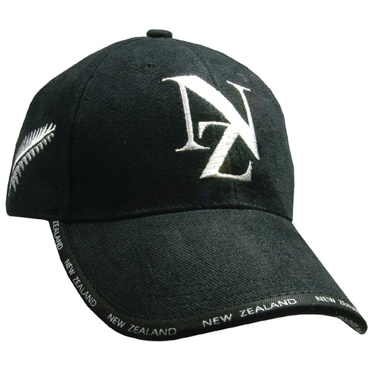 Black brushed cotton baseball cap featuring embroidered white NZ logo and double silver fern design on the side.
