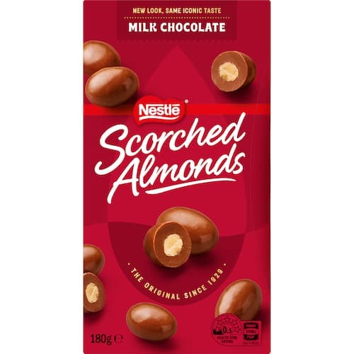 Nestle Scorched Almonds Original Milk Chocolate 180g box featuring whole roasted almonds double-coated in milk chocolate.
